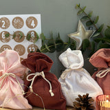 MUSSELIN ADVENTSKALENDER SÄCKCHEN