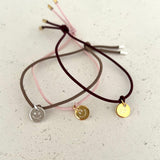 HANDGEFERTIGTES NYLONBÄNDCHEN MIT ANHÄNGER-PLAKETTE "KLEEBLATT, SMILEY, NO SMILEY"