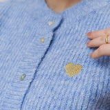 ÄRMELLOSE STRICKWESTE MIT HERZCHEN