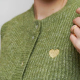 ÄRMELLOSE STRICKWESTE MIT HERZCHEN