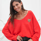ROTER OVERSIZE PULLI „HERZ LEO"