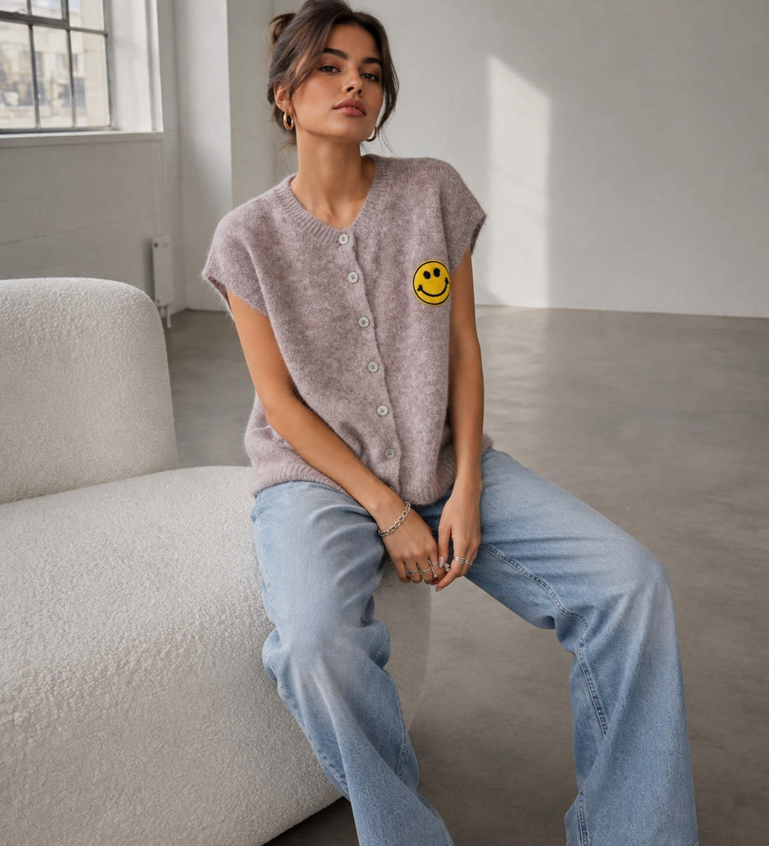 ÄRMELLOSE STRICKWESTE "SMILEY"
